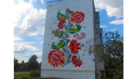 Два будинки Полтави увінчає нове графіті